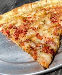 PIZZA FACTORY LOCATED AT LONG ISLAND CITY NY : CHICKEN PARMESAN PIZZA SLICE