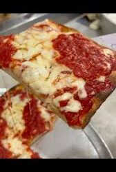 PIZZA FACTORY LOCATED AT LONG ISLAND CITY NY : SICILIAN CHEESE PIZZA SLICE
